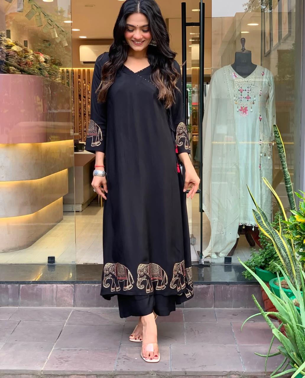 Women's Rayon Embroidered Straight Kurti With Pant Set