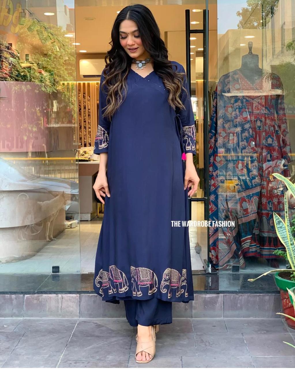 Women's Rayon Embroidered Straight Kurti With Pant Set