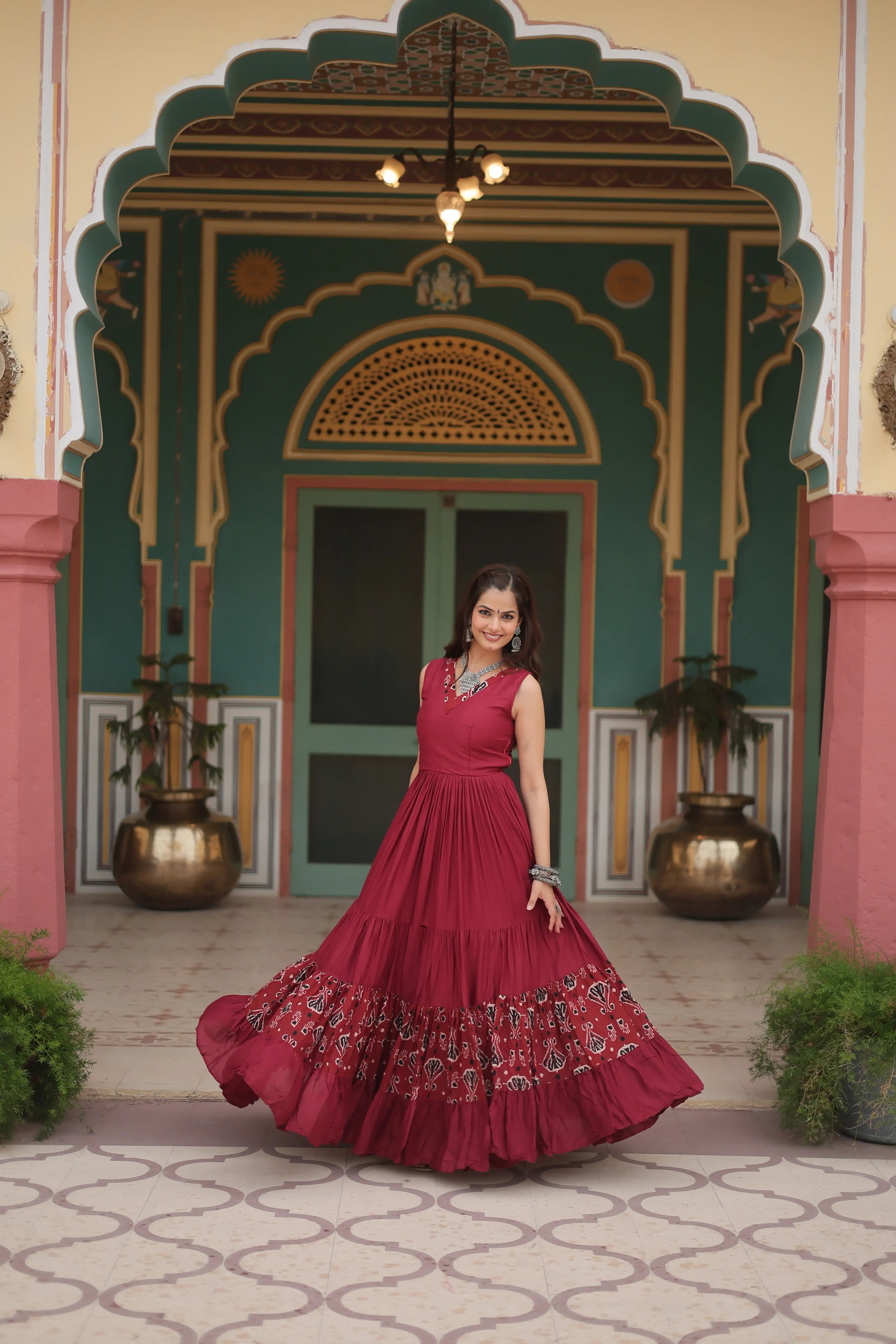 Maroon Designer Heavy Reyon Gown with Printed Frill & Fancy V-Neck