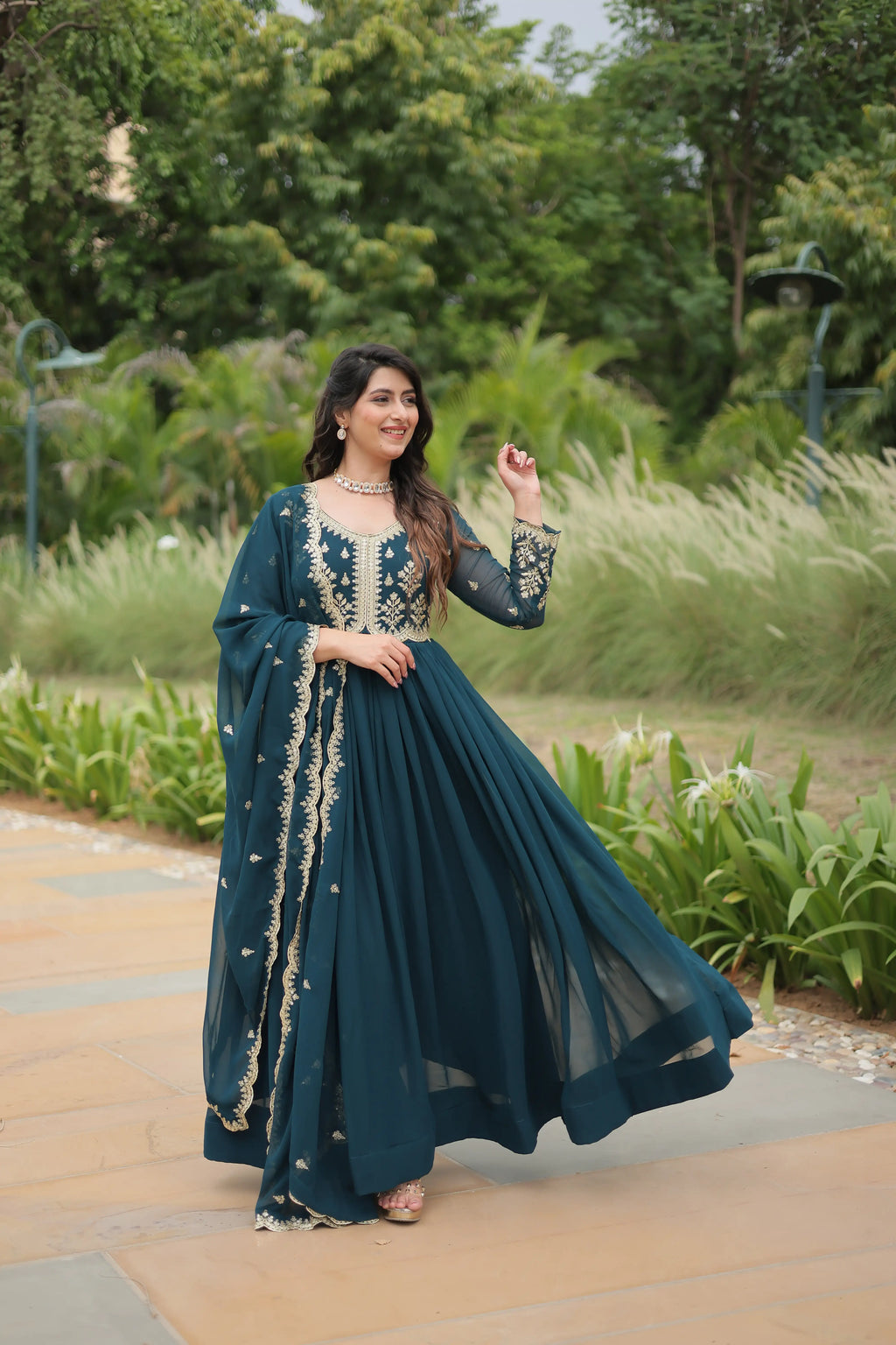 Teal-Blue Elegant Kutchi Gamthi Work Reyon Gown with Heavy Flair
